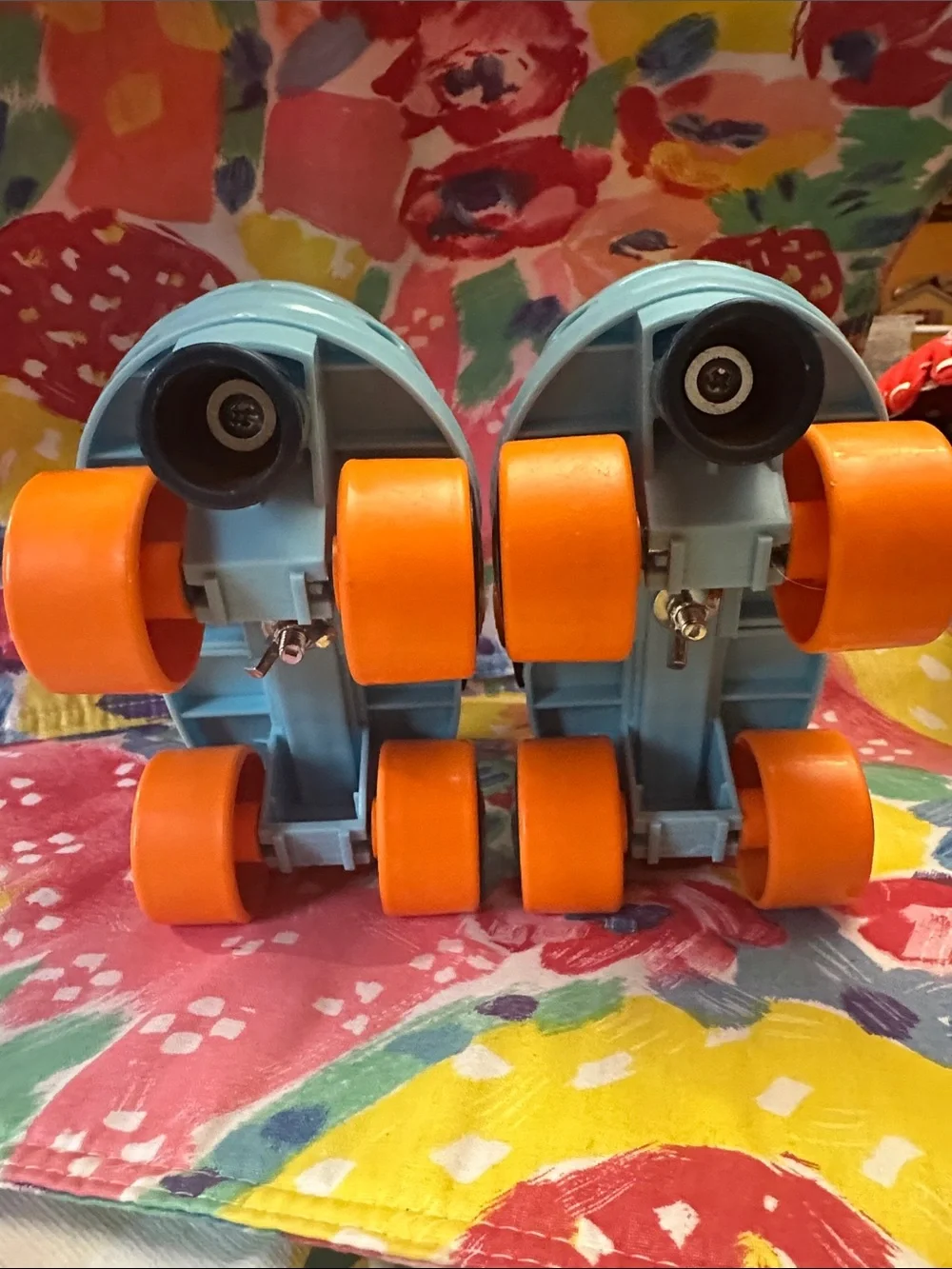 Kids Light Blue Dinosaur Roller Shoes with Orange Wheels